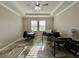 Bright office space features a ceiling fan, large windows and tiled floors at 6244 English Hollow Rd, Tampa, FL 33647
