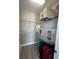 Efficient walk-in closet featuring wire shelving, organizers, and space for luggage storage at 6244 English Hollow Rd, Tampa, FL 33647