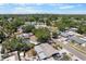 Aerial view of neighborhood showcasing lush tree coverage and community streets at 6307 S Cameron Ave, Tampa, FL 33616