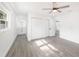 Bright bedroom with modern fixtures leading into an ensuite bathroom at 6811 N Himes Ave, Tampa, FL 33614