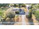 Charming single-story home featuring a well-manicured lawn and inviting curb appeal at 6811 N Himes Ave, Tampa, FL 33614