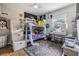 Bedroom featuring a loft bed and desk area with a window at 6816 13Th N St, St Petersburg, FL 33702