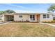 Charming single-story home with tidy landscaping and a cozy, covered entrance at 6816 13Th N St, St Petersburg, FL 33702