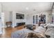 Bright living room with modern decor, tiled floors, and access to a backyard patio at 6816 13Th N St, St Petersburg, FL 33702