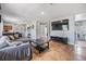 Spacious living room features neutral colors, a large TV, and ample seating at 6816 13Th N St, St Petersburg, FL 33702