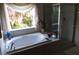Bright bathroom showcasing a large soaking tub and standing shower at 6926 Mccray Dr, Hudson, FL 34667