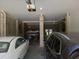 Spacious garage with room for multiple vehicles and storage at 6926 Mccray Dr, Hudson, FL 34667
