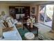 Inviting living room featuring a comfortable seating area and sliding glass doors leading to the outside at 6926 Mccray Dr, Hudson, FL 34667