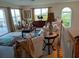 Upstairs living room featuring hardwood floors, seating, and natural lighting at 6926 Mccray Dr, Hudson, FL 34667