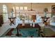 Cozy upstairs living room with hardwood floors and bright natural light at 6926 Mccray Dr, Hudson, FL 34667