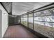 Enclosed patio area with tiled flooring and views of the backyard at 7360 Ulmerton Rd # 17D, Largo, FL 33771