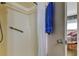 Bathroom featuring a walk-in shower and a view into the bedroom at 7425 Bay Island S Dr # 203, South Pasadena, FL 33707