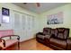 Comfortable bedroom with plush seating and closet, perfect for relaxation at 7425 Bay Island S Dr # 203, South Pasadena, FL 33707