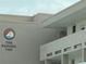 Close up exterior of The Bahama building sign, showing the building number at 7425 Bay Island S Dr # 203, South Pasadena, FL 33707