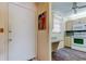 Functional kitchen entrance featuring modern appliances, and convenient access at 7425 Bay Island S Dr # 203, South Pasadena, FL 33707