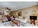 This is a cozy living room with a dining area and a bar in the background at 7425 Bay Island S Dr # 203, South Pasadena, FL 33707