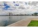 Wide waterfront view of the buildings with a sidewalk on the right side at 7425 Bay Island S Dr # 203, South Pasadena, FL 33707