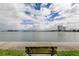 Wide waterfront view of the buildings and calm water from bench at 7425 Bay Island S Dr # 203, South Pasadena, FL 33707