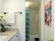 Bathroom featuring a granite countertop vanity and shower with a curtain at 7526 Needle Leaf Pl # 29, Tampa, FL 33617