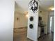 Open-concept living spaces with modern light fixtures and wood-look flooring at 7526 Needle Leaf Pl # 29, Tampa, FL 33617