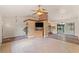 Inviting living area, showcasing an open layout with a smooth transition into the kitchen and dining spaces at 8309 Pebble St, Spring Hill, FL 34608