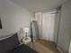 This bedroom features a large mirror, ample closet space, and a comfortable bed at 943 7Th N St, St Petersburg, FL 33701