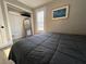 Comfortable bedroom offers closet storage, a serene ambiance, and natural light at 943 7Th N St, St Petersburg, FL 33701