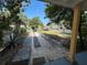 Charming home with a spacious driveway and lush greenery in a desirable neighborhood at 943 7Th N St, St Petersburg, FL 33701