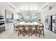 Bright, spacious kitchen with oversized island, stainless appliances, and ample seating at 10418 Spring Tide Way, Parrish, FL 34219