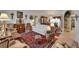 Spacious living room with warm natural lighting and traditional decor, showcasing a comfortable setting at 11120 Lu Wista Ln, Brooksville, FL 34601