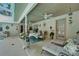 Enjoy your patio with a large pool, seating, ceiling fans and lots of greenery at 11120 Lu Wista Ln, Brooksville, FL 34601