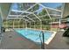 Enjoy the screened in pool with natural lighting to spend time outside at 11120 Lu Wista Ln, Brooksville, FL 34601