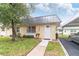 A well-maintained single-story home with a tidy front lawn and convenient covered parking at 11723 Boynton Ln # 1, New Port Richey, FL 34654