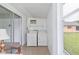 Functional laundry area with washer and dryer, plus access to the outdoors at 11723 Boynton Ln # 1, New Port Richey, FL 34654