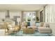 Inviting living room with a comfortable sectional sofa and views to the kitchen at 11761 E 74Th Cir, Palmetto, FL 34221