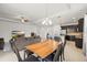Cozy living space featuring an open layout with views of the kitchen and dining areas at 11831 Thicket Wood Dr, Riverview, FL 33579