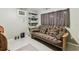 This bedroom features comfortable furnishings and built-in shelving for additional storage at 1202 Williams Rd, Plant City, FL 33565