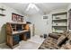 This bedroom features comfortable furnishings and built-in shelving for additional storage at 1202 Williams Rd, Plant City, FL 33565