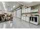 Large garage with a functional kitchenette, offering ample space for various activities at 1202 Williams Rd, Plant City, FL 33565