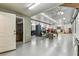 This oversized garage transitions into a cozy interior space with comfortable seating at 1202 Williams Rd, Plant City, FL 33565