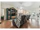 Comfortable living room showcases built-in entertainment center and glass doors to the backyard at 1202 Williams Rd, Plant City, FL 33565