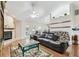 A cozy living room features a fireplace and sliding glass doors that lead to the outdoors at 1202 Williams Rd, Plant City, FL 33565