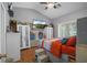 Cozy bedroom with natural light and a ceiling fan for added comfort and style at 12493 Fish Cove Dr, Spring Hill, FL 34609