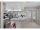 Modern kitchen features sleek countertops, updated appliances, and ample cabinet space, perfect for culinary enthusiasts at 12493 Fish Cove Dr, Spring Hill, FL 34609