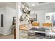Modern kitchen featuring stainless steel oven and hanging cookware at 12606 Rain Forest St, Temple Terrace, FL 33617