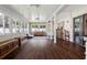 Living area with natural light, wood flooring, and modern furniture at 12606 Rain Forest St, Temple Terrace, FL 33617