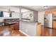 Living room and kitchen with an open floor plan, perfect for entertaining at 1310 Hilton Pl, Tampa, FL 33604