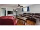 Comfortable living room with hardwood floors, large windows, and stylish furnishings at 1310 Hilton Pl, Tampa, FL 33604