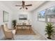 Bright office featuring natural light, desk, chair, and plants at 1341 Sandy Ln, Clearwater, FL 33755