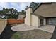 Private backyard featuring a patio and fenced yard at 13703 Sweetwater Cove Pl, Tampa, FL 33613